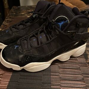Jordan’s Black and Blue Athletic Sneakers